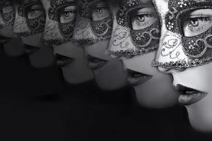 Close Up Portrait Of Women In Mysterious Venetian Masks By Grachikova Larisa Via Shutterstock