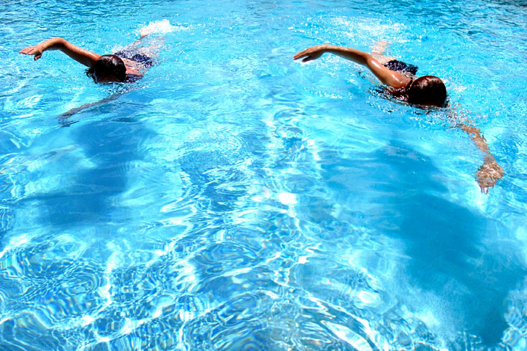 Swiming By Imagedepotpro Via Istock