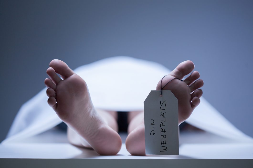 Close Up Of Human Feet In Morgue