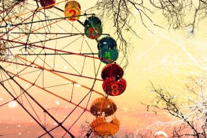 New Year 2018. Two Thousand Eighteen. Ferris Wheel. Naked Trees Under A Snowfall Against Sunrise Sky. Winter Dream