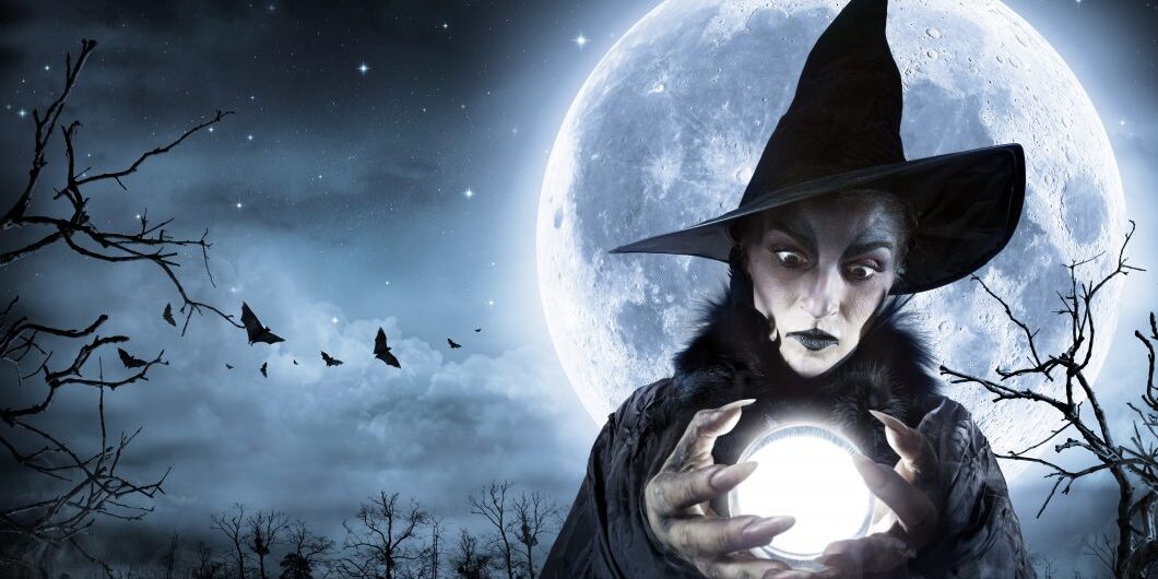 Halloween witch clairvoyant in a spooky night