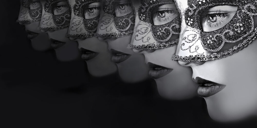 Close Up Portrait Of Women In Mysterious Venetian Masks By Grachikova Larisa Via Shutterstock