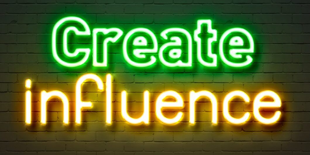 Create Influence Neon Sign On Brick Wall Background.